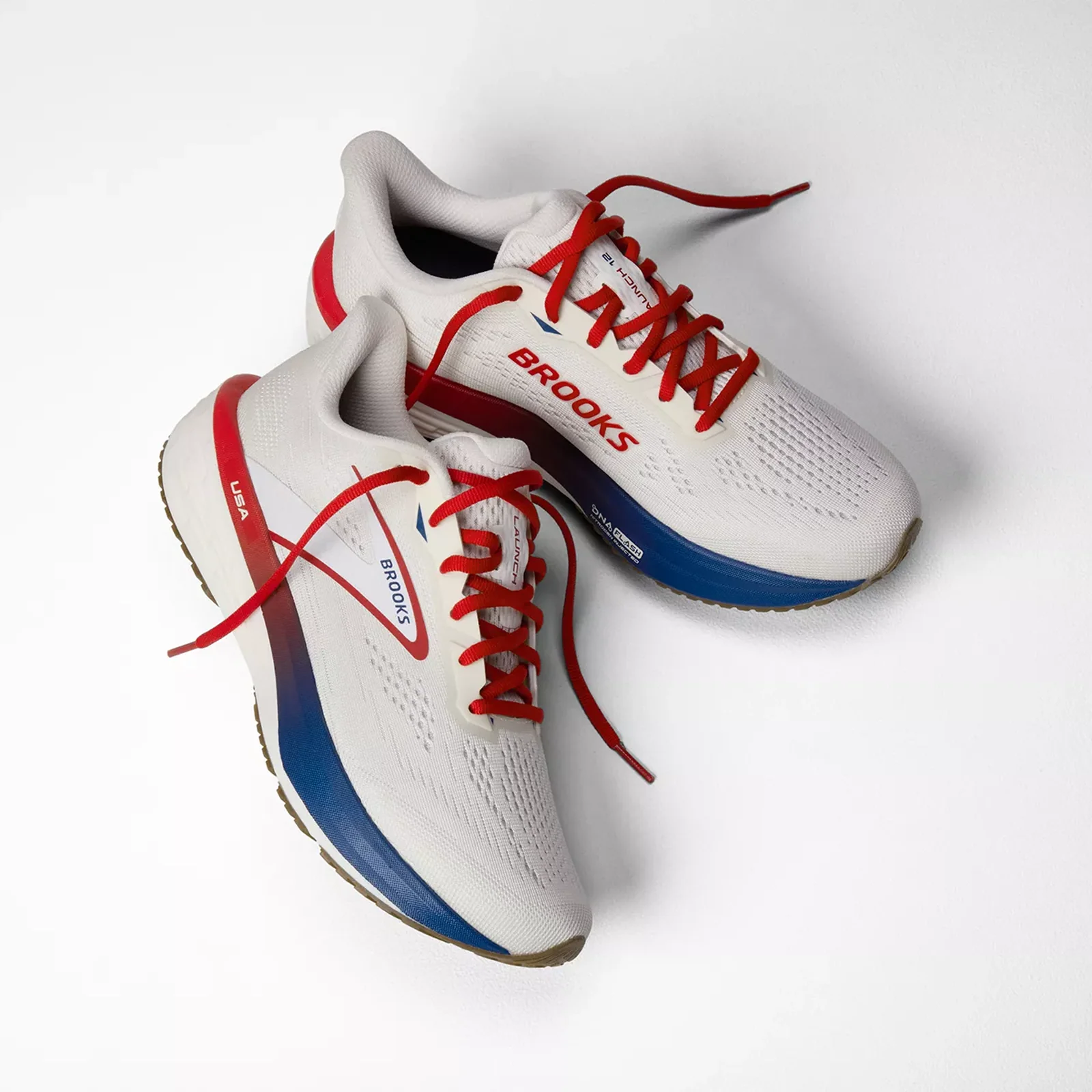 Brooks Launch 12 Running Shoe (Women) - Coconut/Red/Blue - Image 7