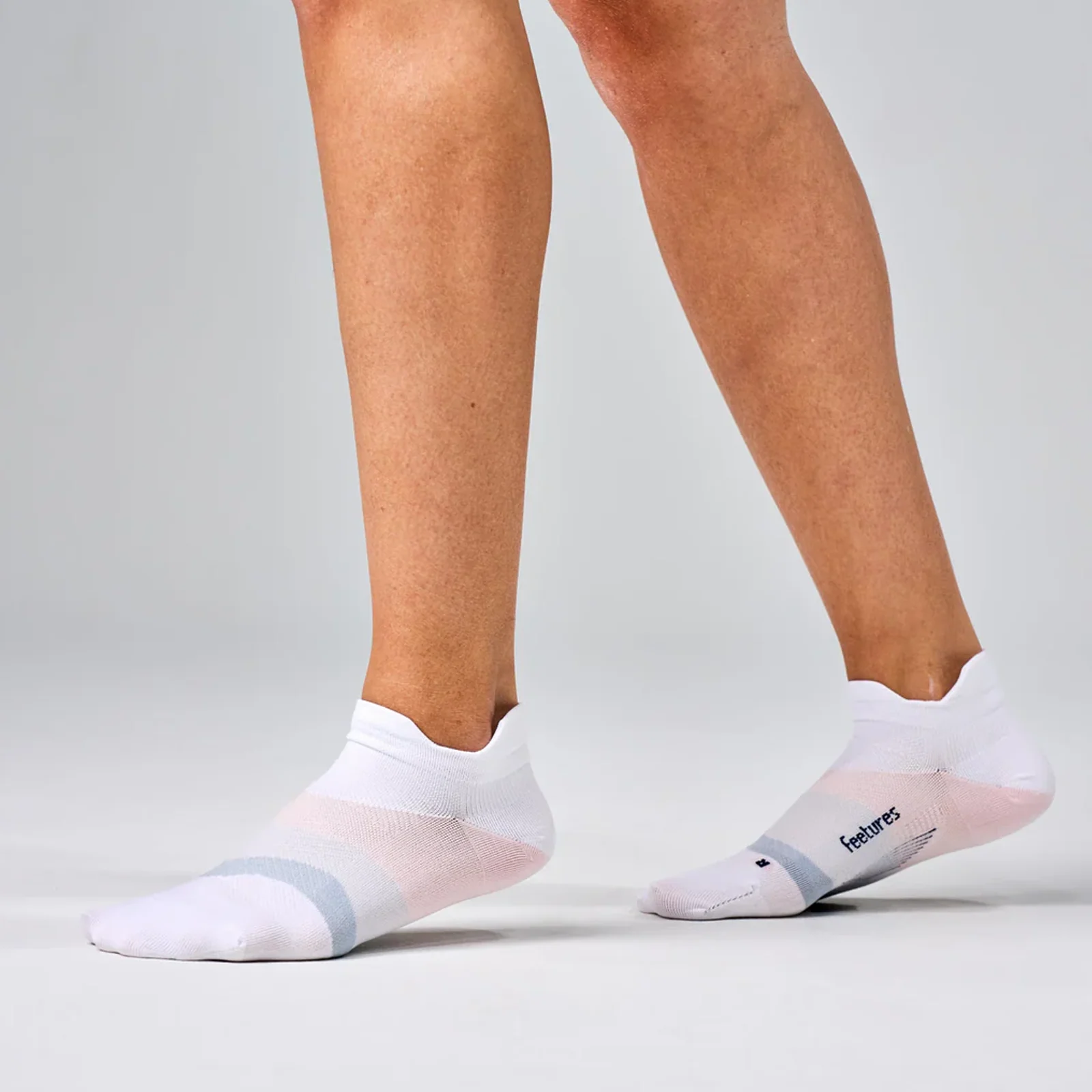 Feetures Elite Ultra Light No Show Tab Sock (Unisex) - White Rose - Image 3
